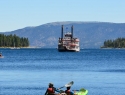 Kayakers in Emerald Bay and the Tahoe Queen