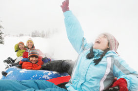 people snow tubing