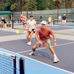 two players on pickleball court